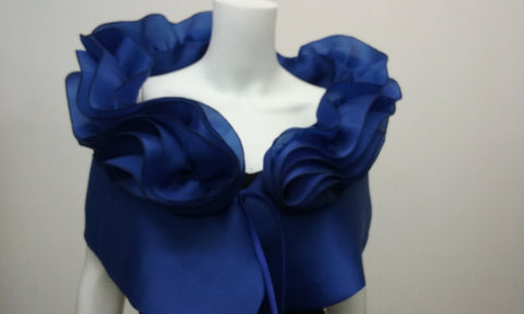 Blue 100% silk evening wrap that has a two tiered collar at the top. A special occasion, high fashion piece, perfect for the red carpet, or your own special occasion. It measures 48" x 14" with a  tie closure , but can be made larger on request.