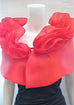 Bright Red with orange lining This is a 100% silk evening wrap that has a two tiered collar at the top. A special occasion, high fashion piece, perfect for the red carpet, or your own special occasion. It measures 48" x 14" with a  tie closure , but can be made larger on request.