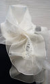 white Lace scarf with organza ruffle and loop closure for easy adjustment; available in black, white, cream, or black with pink ruffle;  measurements: 45" x 11"