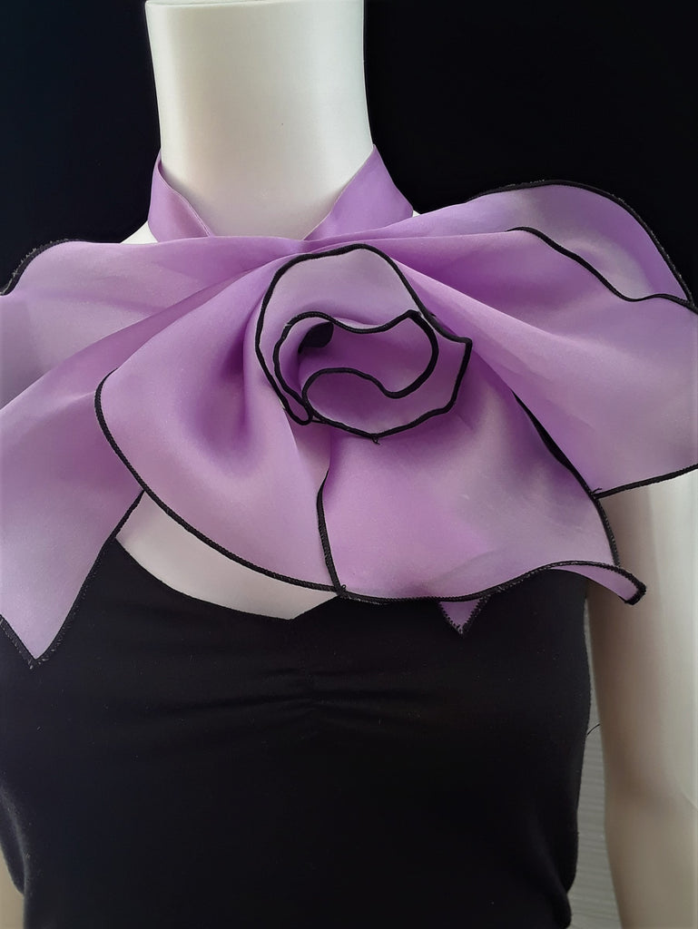 Neck piece with flower