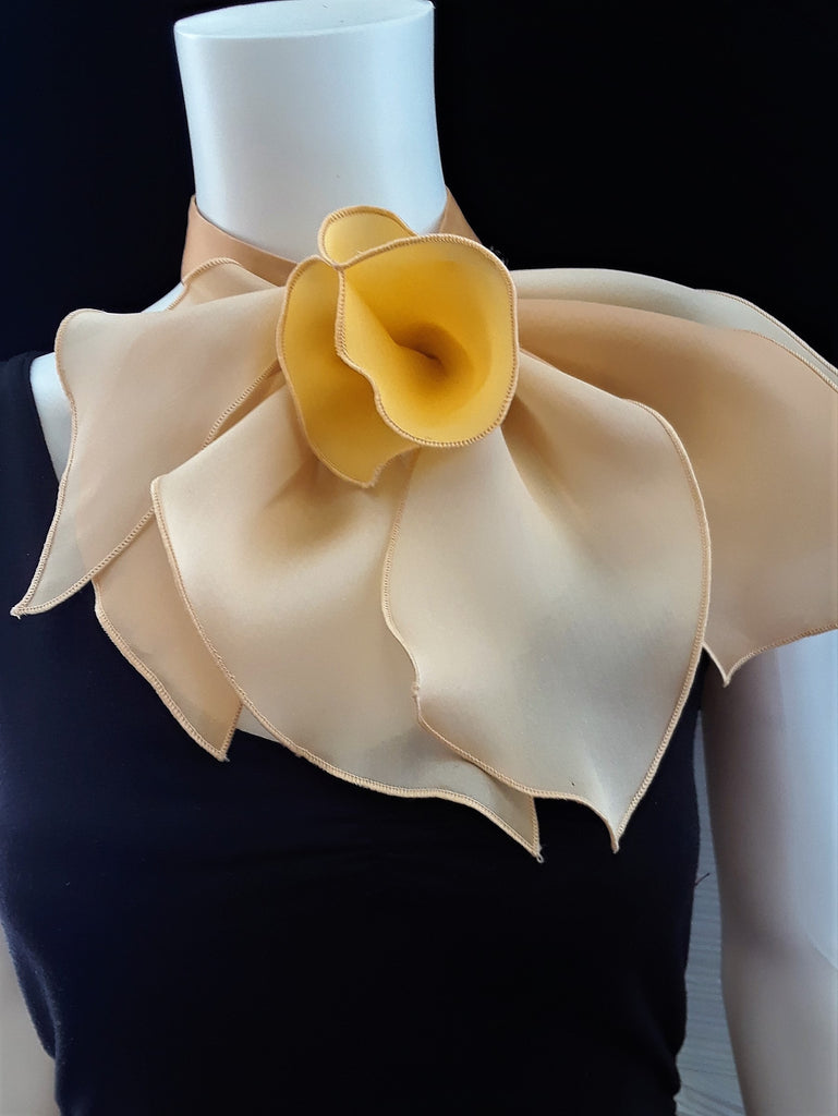 Neck piece with flower