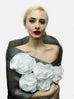 This floral wrap is made of metallic silk organza and features a fold down collar and 5 flowers made of a combination of satin organza and silk organza.  The piece is available in all black, for a very dramatic look, but the flowers are also available in colors -  rose, orange and pink.  Another combination is silver with white flowers. It has a snap closure and but as with all the styles, can be customized for larger sizes.