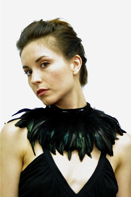 Choker with satin faced organza band and coque feathers; snap closure.  