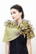 This versatile evening wrap is made of metallic silk organza and features 48 petals. The ends are narrow, allowing the piece to be tied to create several stunning variations. These include wearing this wrap with the petals near the neck, turning it up side down and folding the collar so that the petals are at the bottom; tying the ends in the back to create a shrug, or folding and draping around the neck to make a boa .2