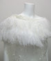 Ostrich feathers on silk organza backing and tie closure. close up