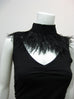 Black Lace and ostrich feather choker with snap closure.  Measurements: 18" x 2" lace and 5" feather fringe.