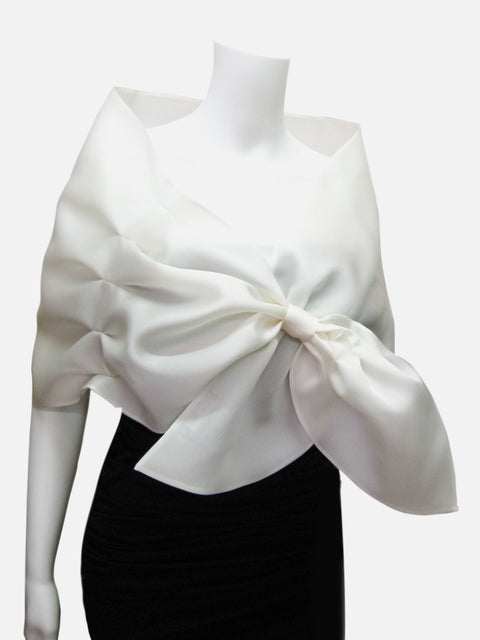 White Satin faced organza wrap with pleated detail and loop closure. 